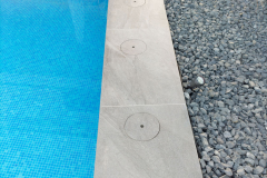 coronacion de piscina en porcelanico